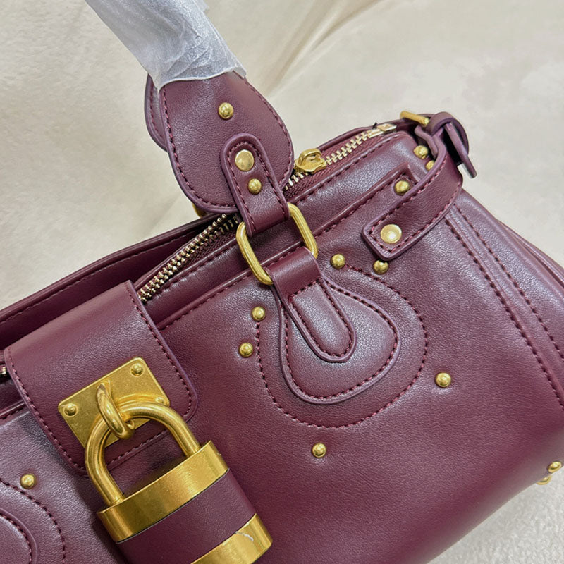 Women’s Vegan Leather Studs Boston Handbag with Large Lock