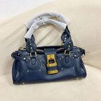 Women’s Vegan Leather Studs Boston Handbag with Large Lock