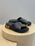 Chypre Sandals in black and gold-tone