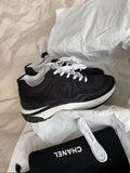 Runner Sneakers in black and white