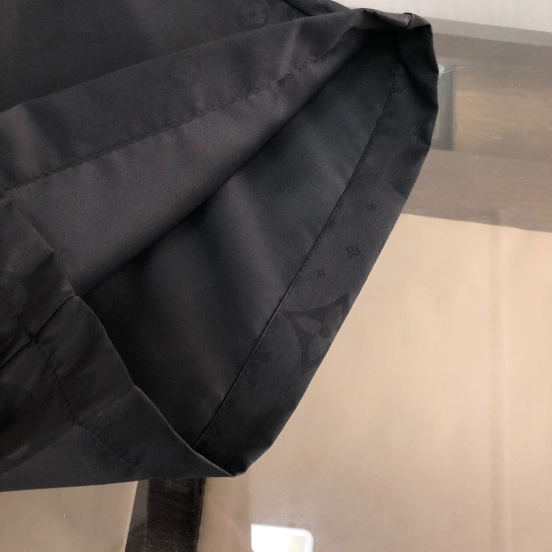 Embossed Monogram Swim Trunks in black