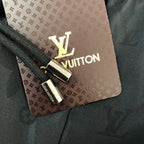 Embossed Monogram Swim Trunks in black