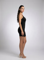 Halcyon V Neck Spaghetti Strap Ruched Mini Dress in Black