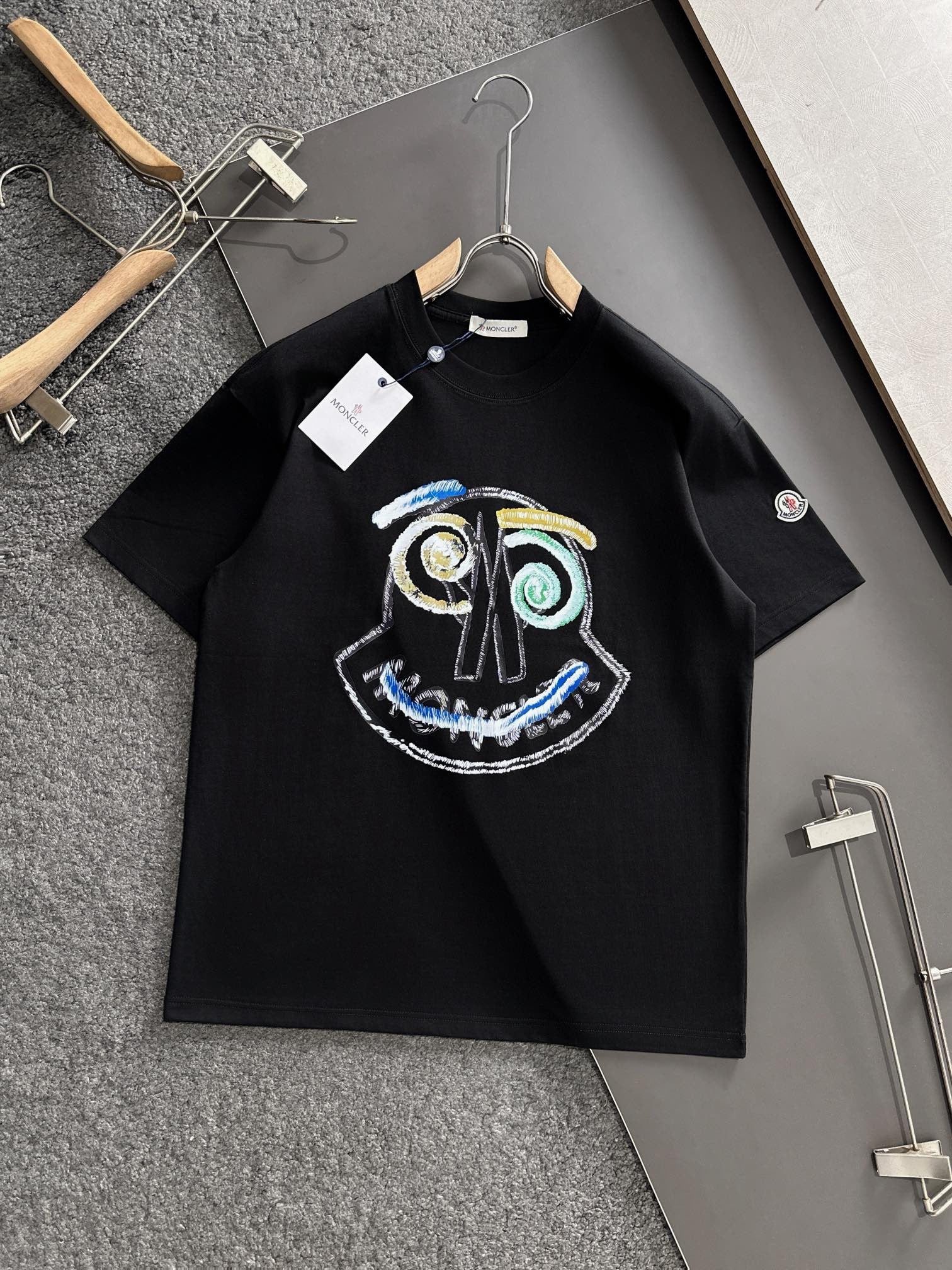 Genius T-Shirt – Black Crew Neck Tee with Multicolour Character Graphic — product image