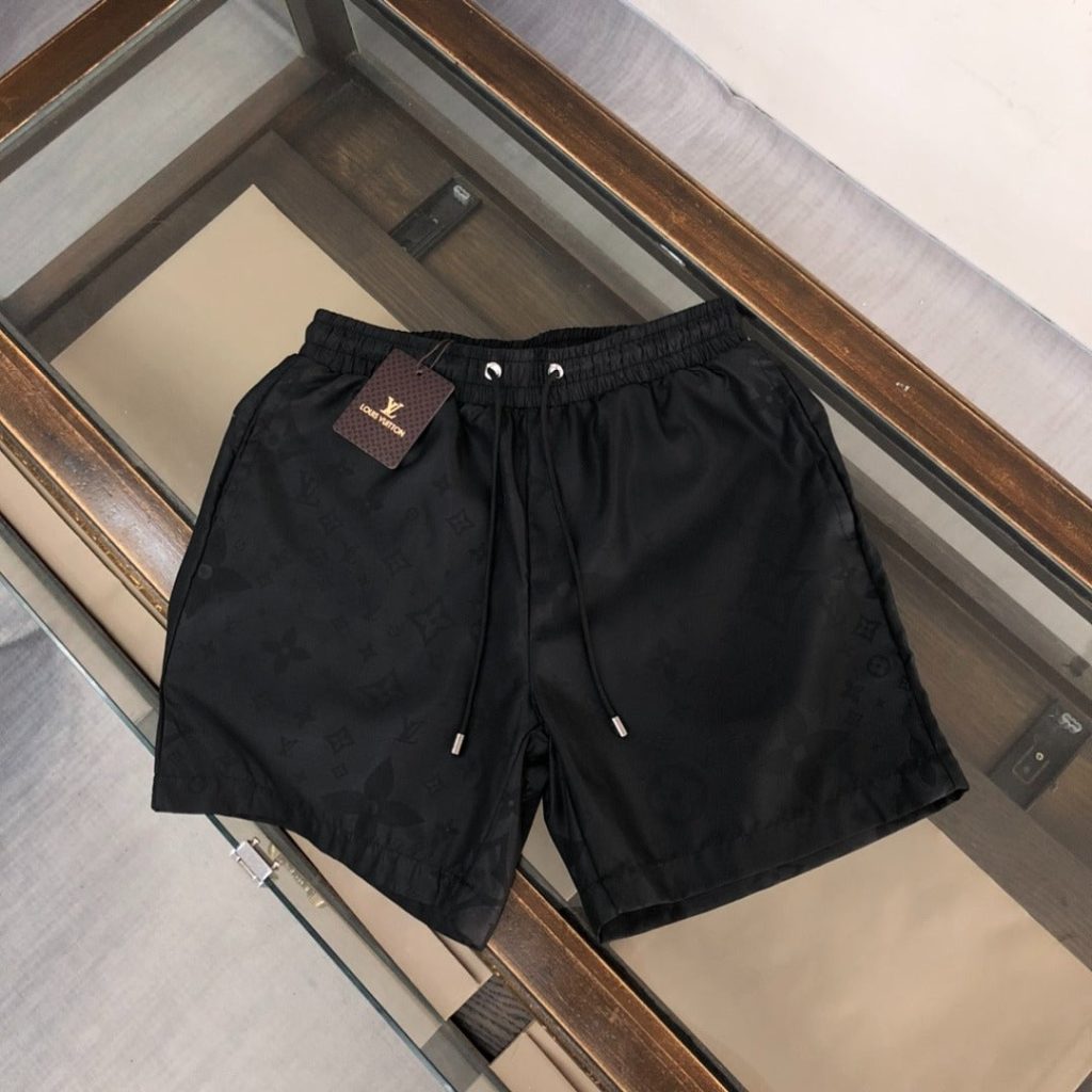 Embossed Monogram Swim Trunks in black